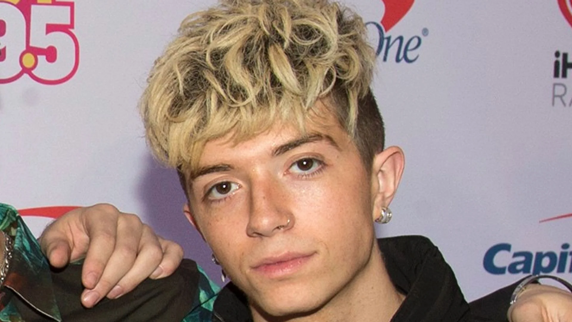 Ex-girlfriend of boyband singer charged in alleged murder-for-hire plot