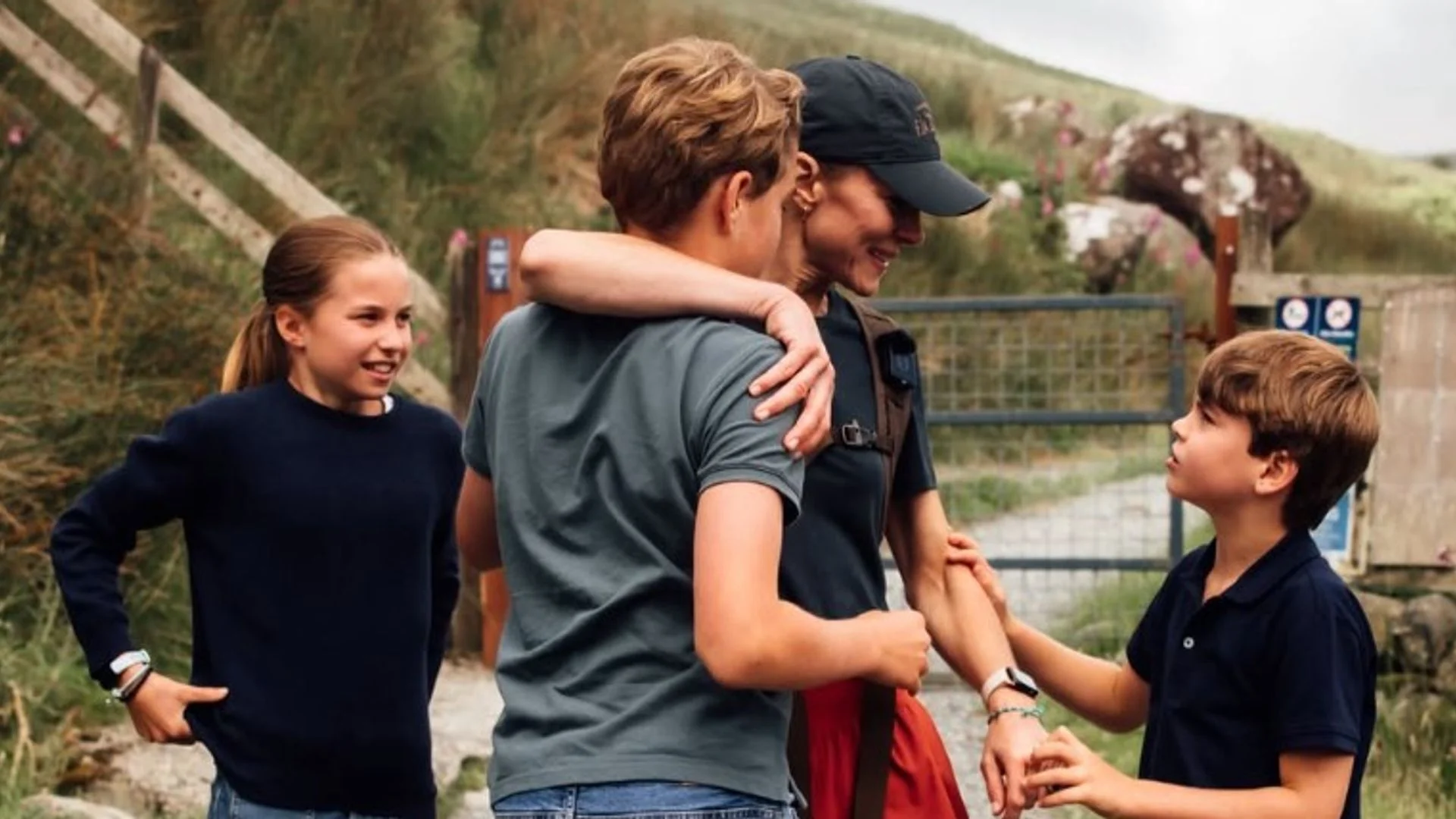 Kate hugs family at end of hiking challenge in newly-released photos