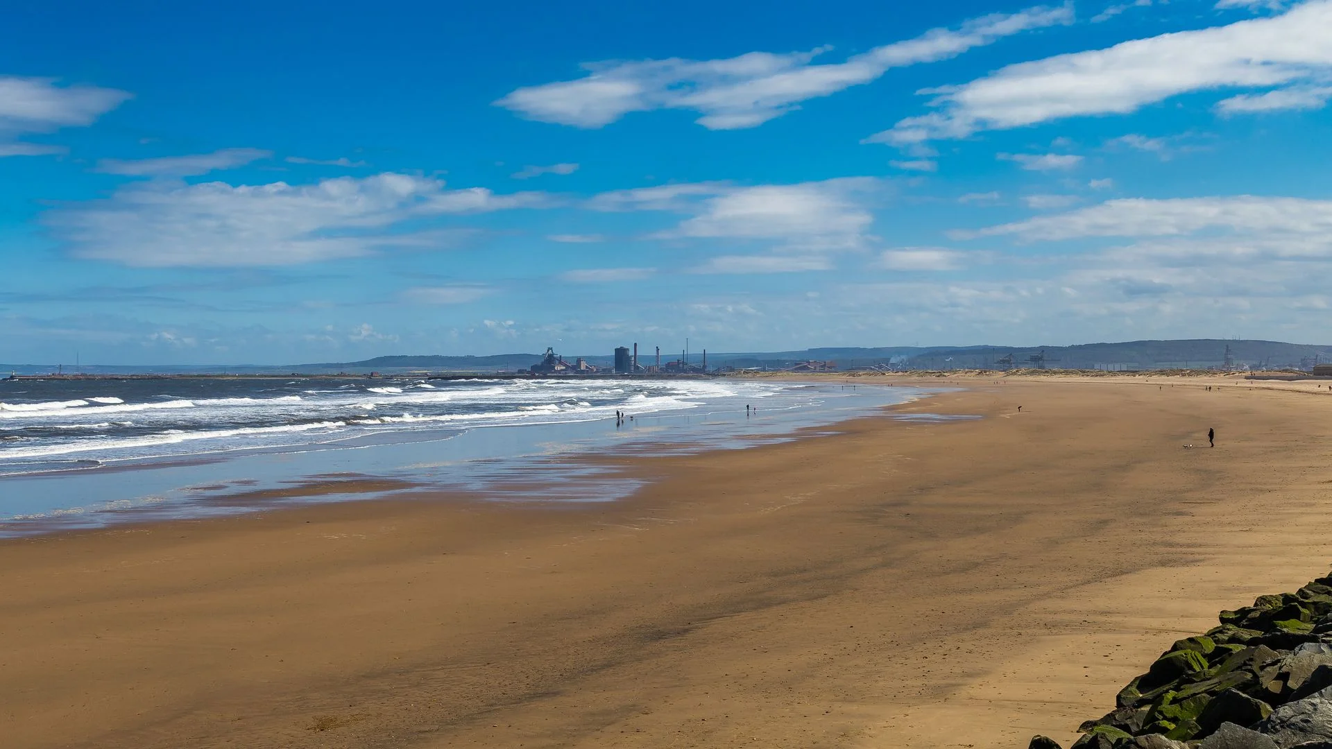 Two men die after going into sea to save children at UK beach