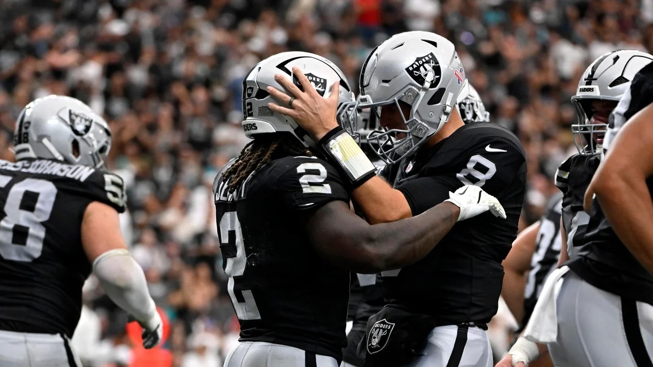 Kirk Cousins hits 301 career TD passes as Raiders open the season with a 27-13 win over Dolphins