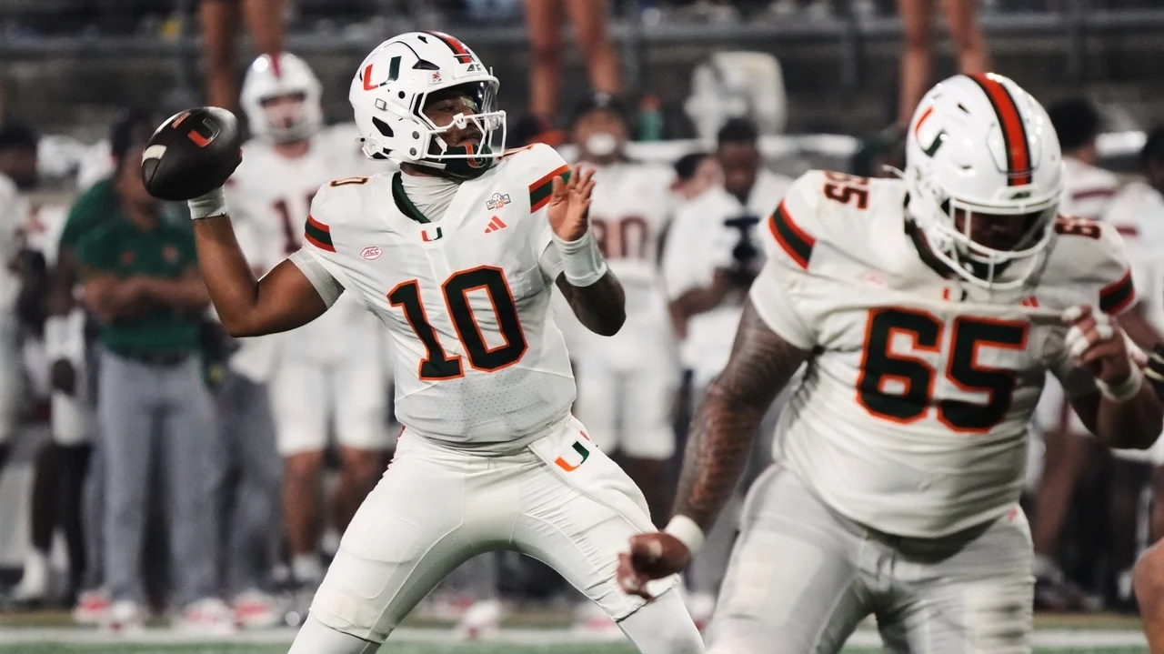 Mensah sets ACC consecutive-completions marks, defense rises in 4th as No. 5 Miami tops Wake Forest
