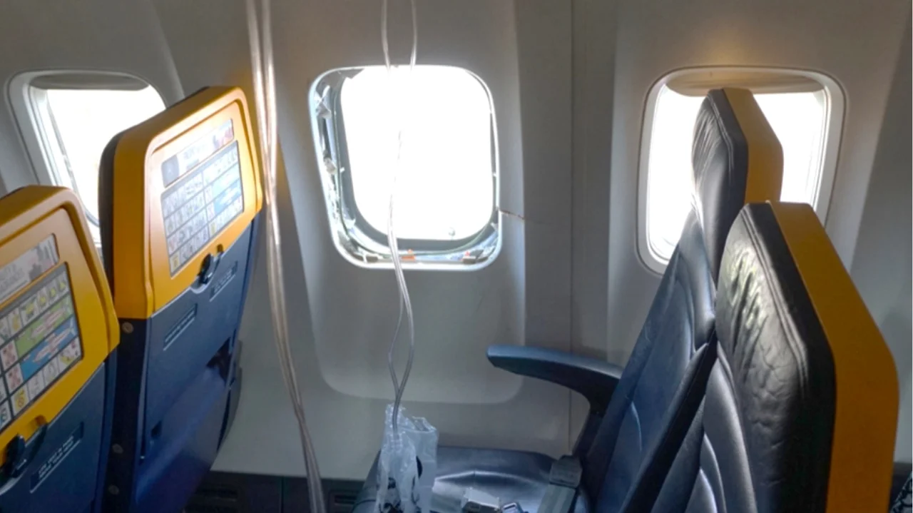 Ryanair CEO disputes report that an injured passenger was partly sucked out a shattered window