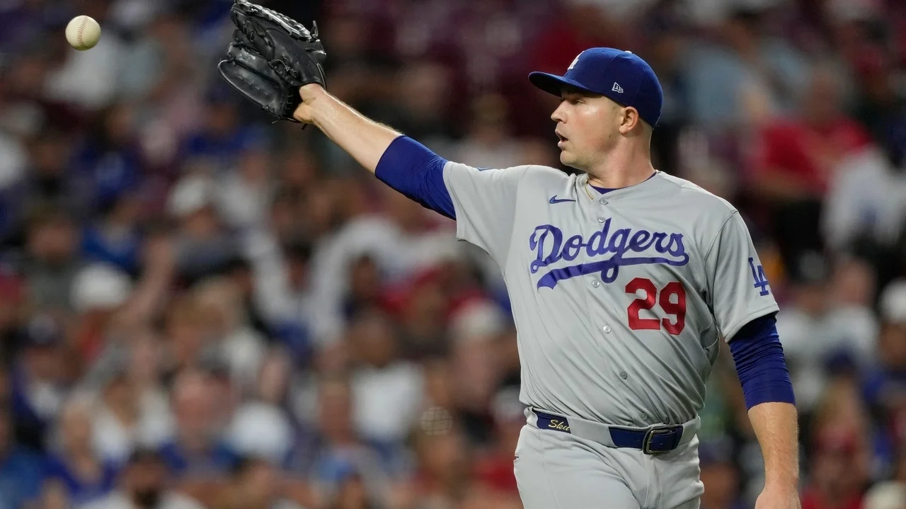 A quiet toast as the Dodgers clinch record-tying 14th straight playoff spot