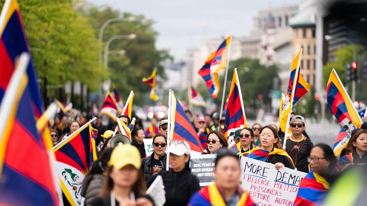Protesters of Xi's policies push for change in earshot of White House visit with Trump