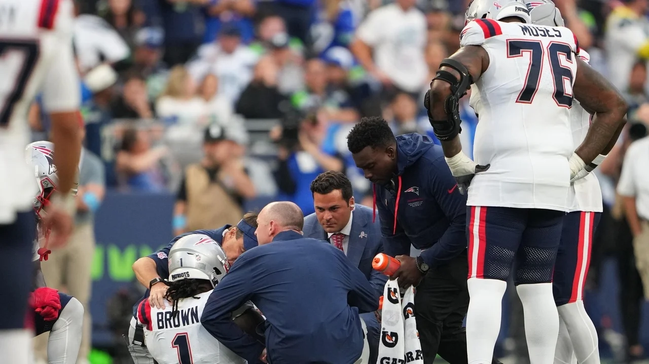 A.J. Brown leaves his Patriots debut with an ankle injury