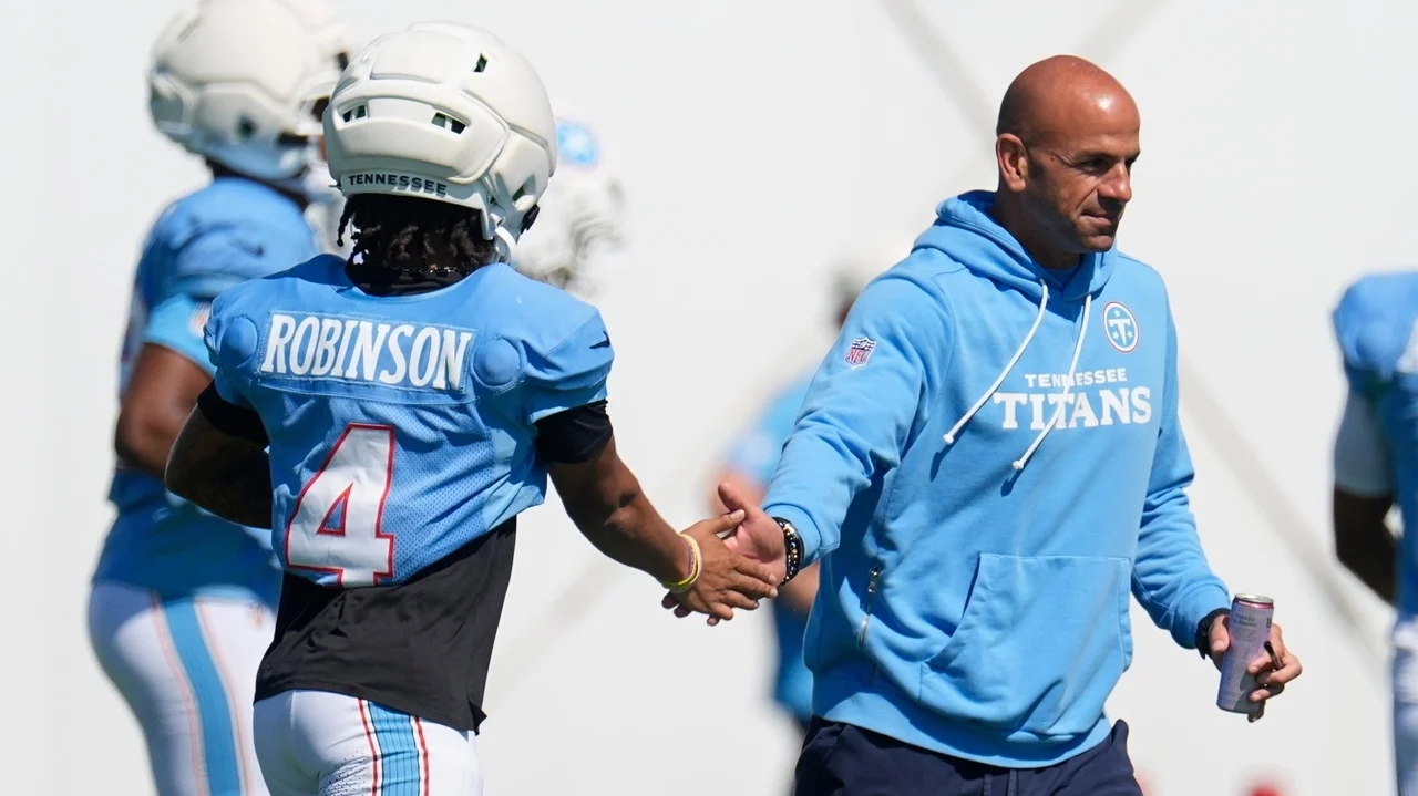 Titans coach calls hit by Bears safety Xavier Woods on Wan'Dale Robinson in joint practice 'cheap'