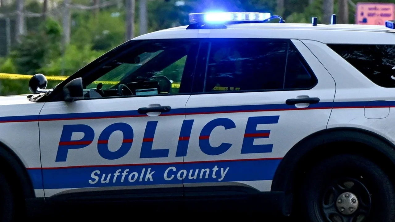 Suffolk police block Sayville street for investigation