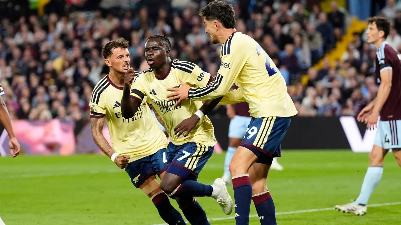 Saka makes the diference as Arsenal down Villa to maintain winning start