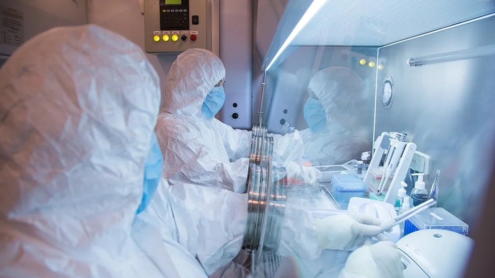 A Russian report says a worker at a Siberian plague institute fell ill and died of an unknown cause