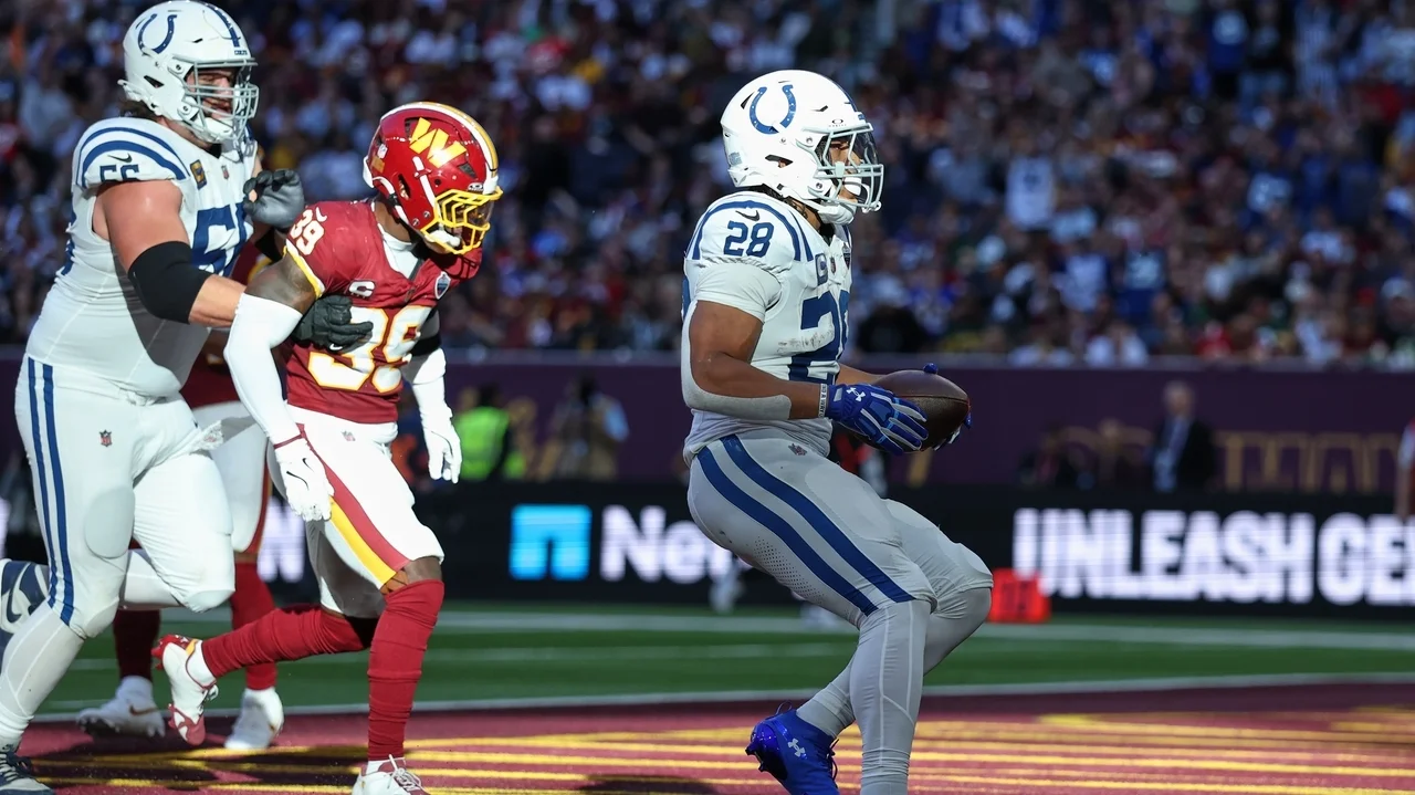 Taylor runs for 2 TDs and Colts beat Commanders 30-13 in London