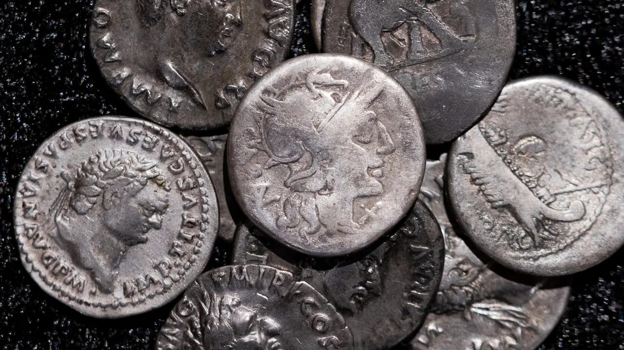 Amateur archaeologist finds Germany's biggest hoard of ancient Roman silver coins