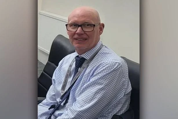 Stretford Grammar headteacher dragged under car for a mile, murder trial told