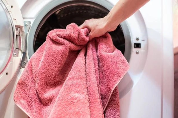Stiff towels will be fluffy and soft again if you add 1 thing to the wash – not vinegar