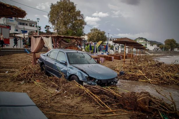 Man dies as Greece holiday hotspot battered by flash floods