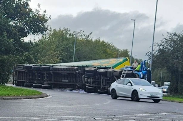 Major Warrington road closed after lorry overturns