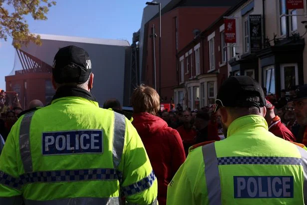 Officer 'seriously injured' as 10 arrested at Liverpool v Man City match