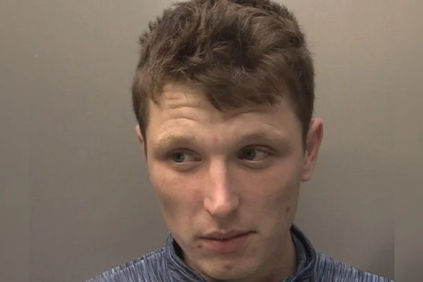 Wanted man robbed Rock Ferry Post Office before he was caught in a back garden